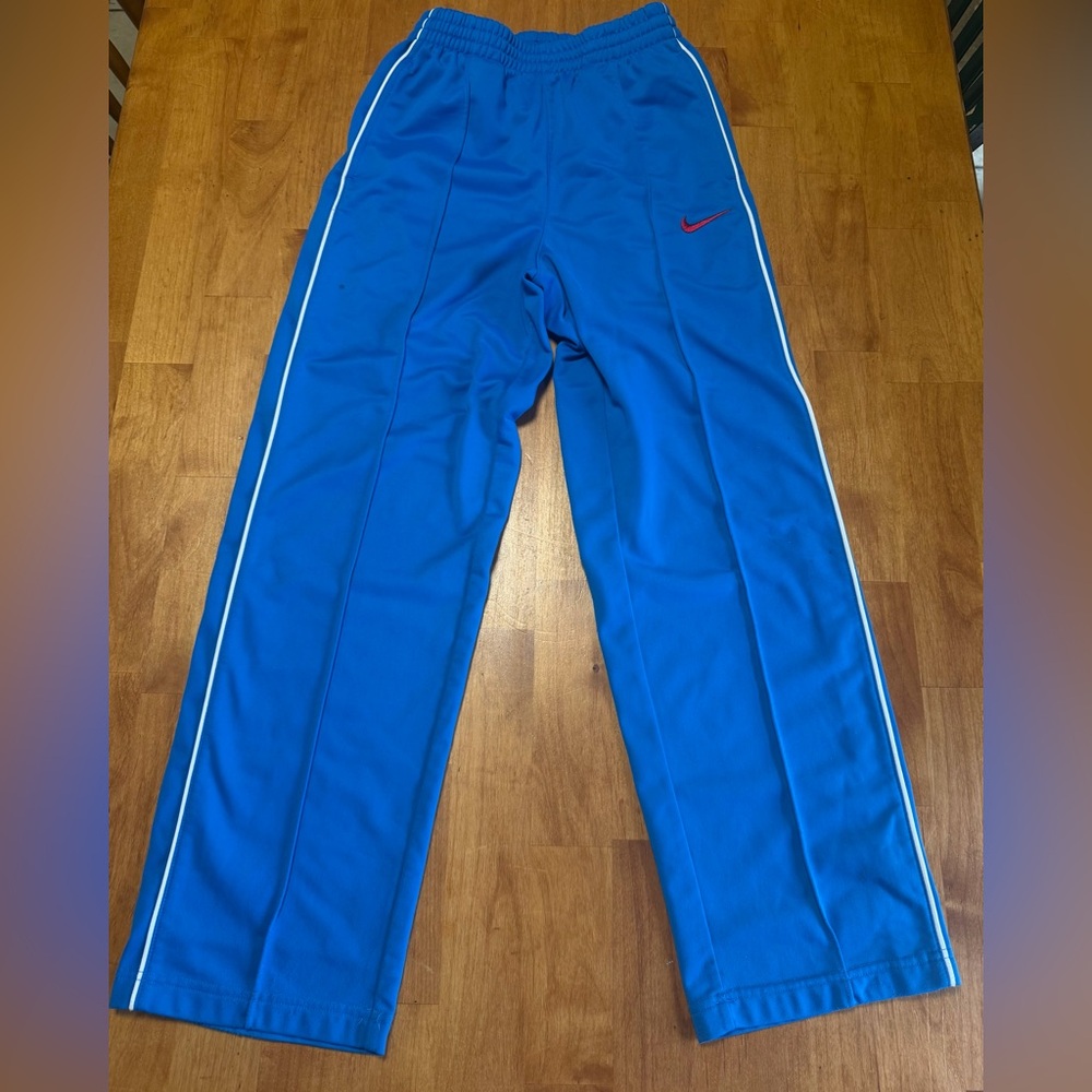 Nike Royal Blue Kids Track Pants with White Piping and Red Swoosh
